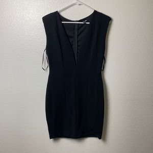 Plunging black mini dress